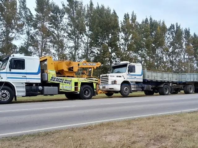 Unidades de Guinche junto a camiones de carga